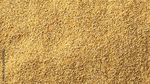 Close-up of coarse yellow sand texture background granular