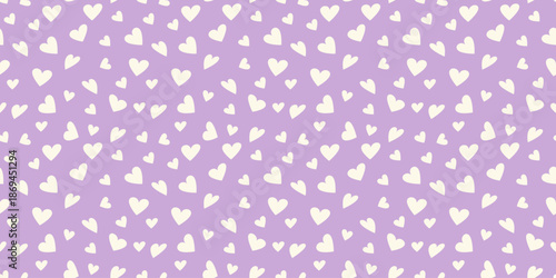 Seamless vector pattern with cute white hearts on soft lavender background, playful romantic repeat for fabric, wrapping, wallpaper, stationery, nursery decor and gift design