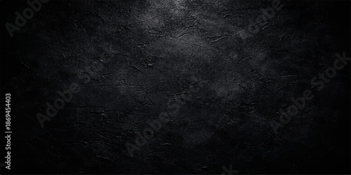 Dark grunge black and white concrete wall texture with a rough vintage stone surface and dirty old paper backdrop for a blank textured chalkboard design