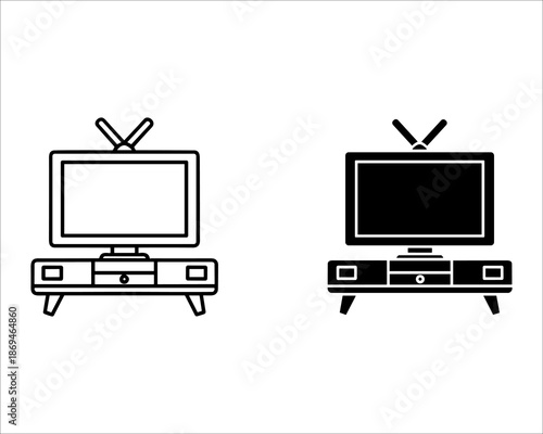 Two televisions one turned on and one turned off on stands with antennas black screen