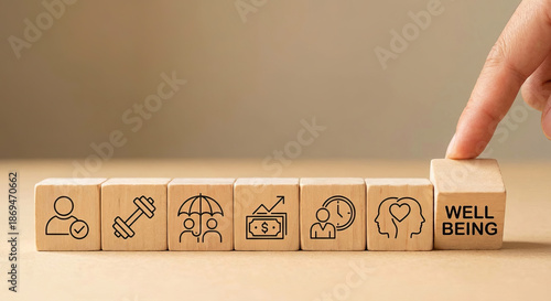 Human Hand Pushing Wooden Block with 'WELL BEING' Text and Life Balance Icons
