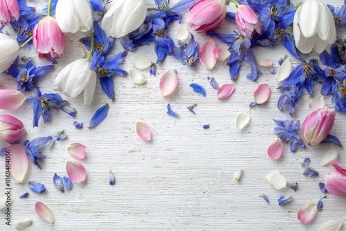 Spring Tulip and Cornflower Petals Scattered on White Wood Surface, Soft Light
