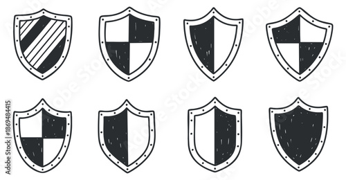 A set of nine decorative shields in black and white vintage vector style, suitable for gaming and branding projects