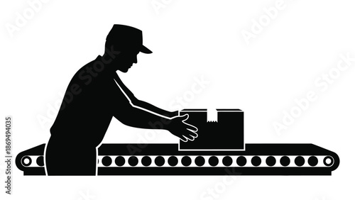 Silhouette of factory worker processing and handling packaged goods on an automated production conveyor belt system
