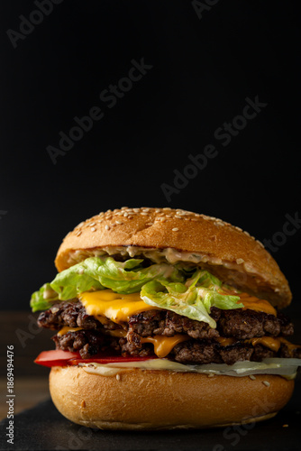 One smash burger on black background