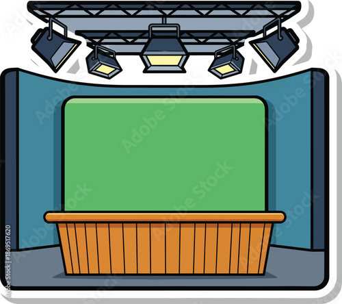 A cartoon image of a stage with a green screen, wooden desk, and spotlights