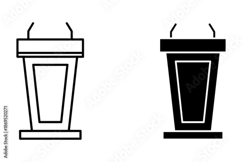 Two podiums with microphones one black and one white on a white background
