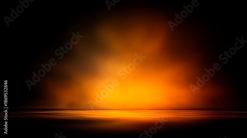 A blurred orange shade of glowing light on a black studio wall background, providing a versatile template for creative projects, background designs, and abstract visual concepts with warm illumination