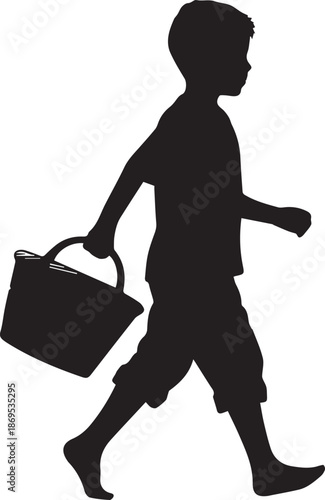 Silhouette of a boy carrying a bucket
