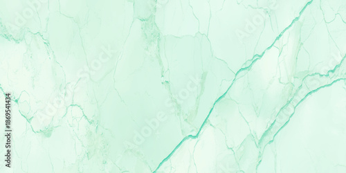A serene and delicate mint green marble texture with subtle turquoise veins flowing throughout the surface