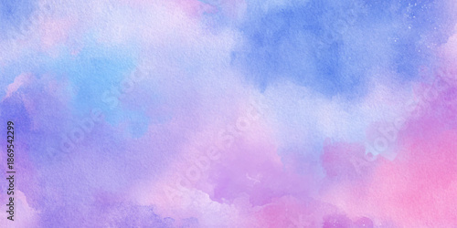 A vibrant watercolor wash of soft blues pinks and purples creates an ethereal and dreamy abstract background texture