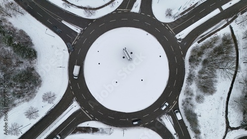 Aerial Winter Roundabout with Snow-Covered Roads