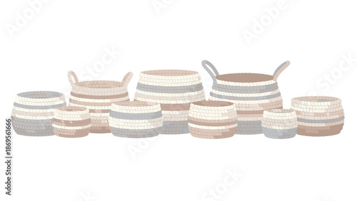 Various sizes of neutral-toned woven baskets arranged on a surface.