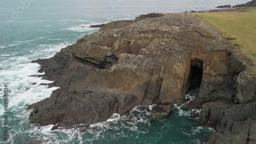 Scenic 4K aerial video of flying above spectacular Atlantic coastline, with picturesque rocks, cliffs and islands, Sybil head, Dingle Peninsula, Kerry, Ireland
