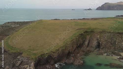 Scenic 4K aerial video of flying above spectacular Atlantic coastline, with picturesque rocks, cliffs and islands, Sybil head, Dingle Peninsula, Kerry, Ireland