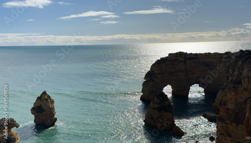 Landscape with natural arch, near Praia da Marinha, one of the most famous place of Portugal, located on the Atlantic coast in Lagoa, Algarve