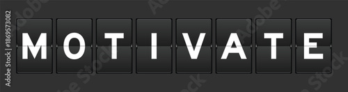 Black color analog flip board with word motivate on gray background