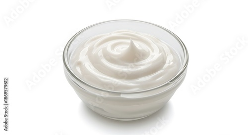 Creamy Swirled Yogurt in Glass Bowl, Isolated on White Background, Studio Shot.