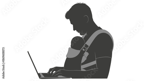 Dad working on laptop with baby on his back