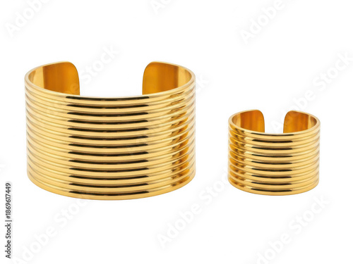 Elegant gold tone cuff bracelet and ring set isolated on transparent background
