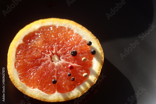 Wallpaper Mural Grapefruit with black pepper on a black background Torontodigital.ca