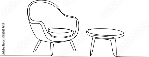 Minimalist black of a modern armchair and side table