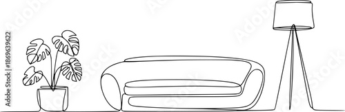 Minimalist continuous of a monstera plant and sofa with a tripod floor lamp