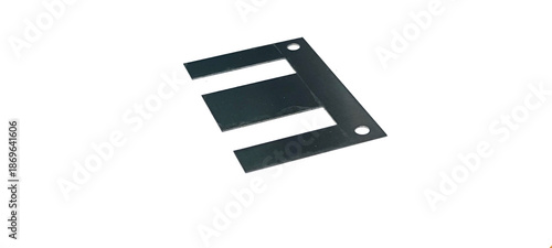 Fotografie Ferrite core for transformers on a white background.