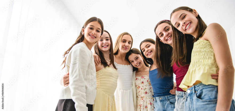 Obraz premium Group Of Teenage Girlfriends on studio white background