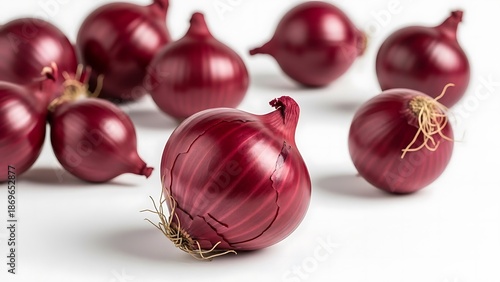 Fresh red onions on white background