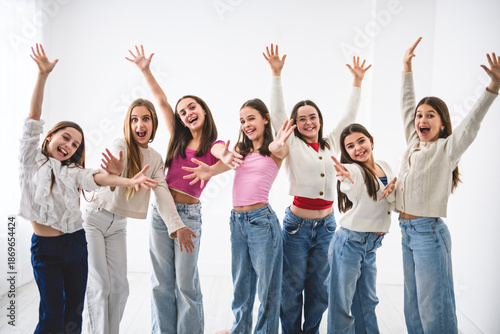Group Of Teenage Girlfriends on studio white background