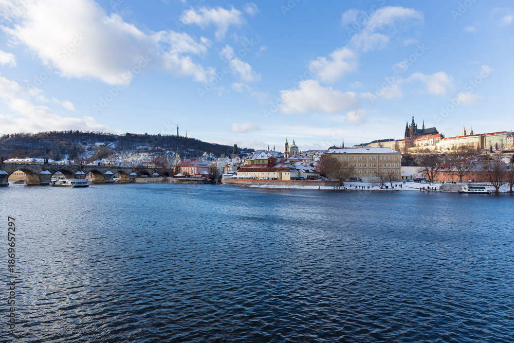 Fototapeta premium Snowy Prague Lesser Town with gothic Castle, Czech Republic