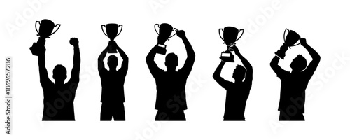 Silhouette of champions holding trophy cups aloft in celebration of victory and success in sporting events or competitions
