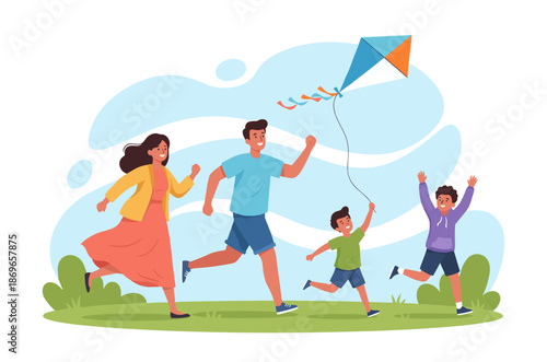 Family flying kite in sunny park
