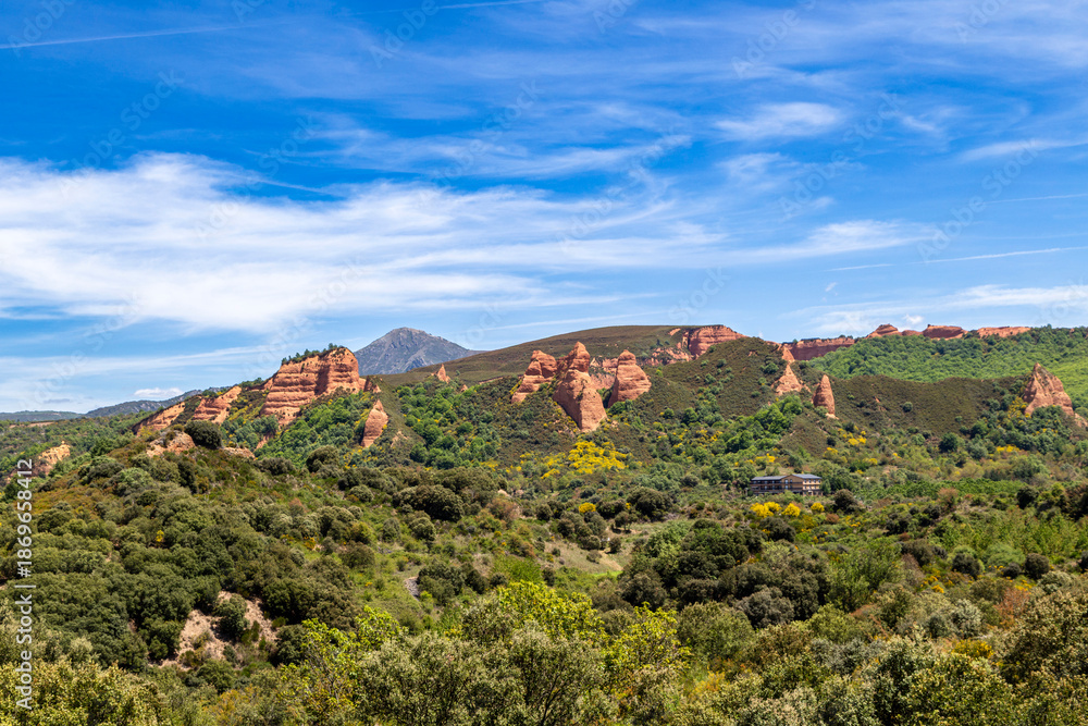 Obraz premium Distant panoramic view of Las Médulas ancient Roman gold mine with red clay peaks from the 1st century, Leon, Spain