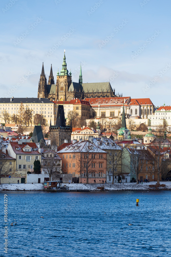 Obraz premium Snowy Prague Lesser Town with gothic Castle, Czech Republic 