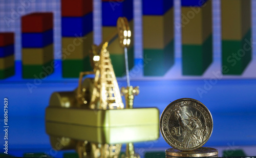 The US dollar against the background of an oil pump and a chart