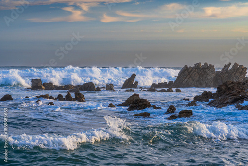 Meeting point of Atlantic and Indian Ocean in Cape Agulhas, South Africa. Garden Route