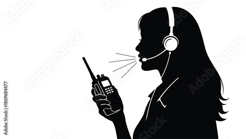 Silhouette of a woman communicating with a radio and headset microphone