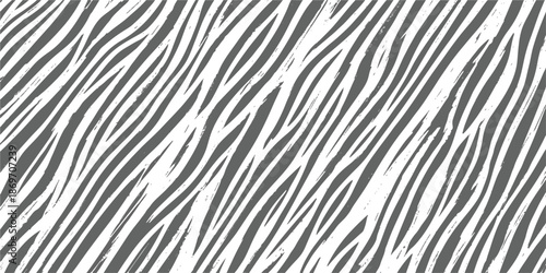 A modern black and white zebra print pattern with diagonal wavy lines for a bold design