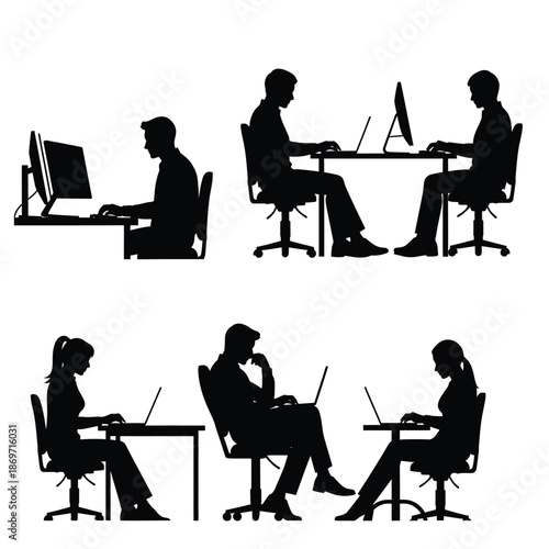 Office workers sitting at desks using computers in a modern workspace environment viewed from the side