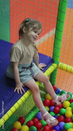 children's playroom. ball pit.Slow motion video.Vertical video. High quality 4k footage