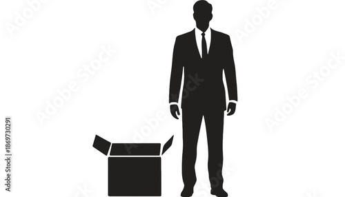A silhouette of a businessman standing next to an open cardboard box