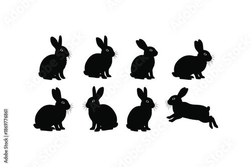 Seven black rabbit silhouette poses on white background