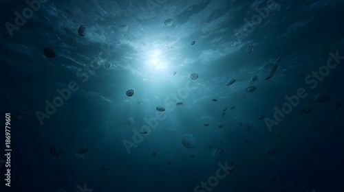 Wallpaper Mural Sunlight streams into the deep blue ocean illuminating floating bubbles and creating an ethereal underwater scene Torontodigital.ca