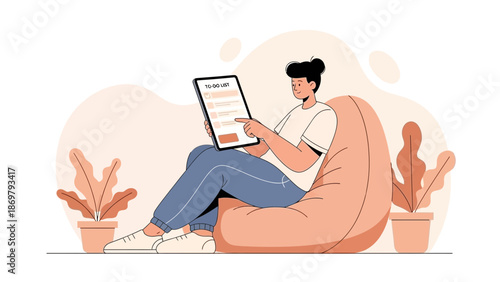 Man using tablet with to-do list on bean bag chair, surrounded by plants