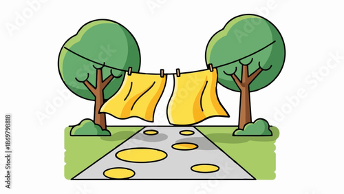 Two trees hold a clothesline with yellow cloths blowing in the wind