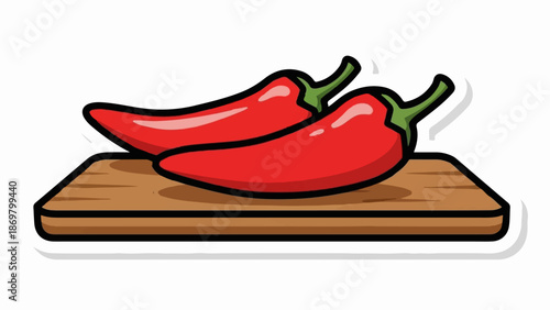 Two bright red chili peppers resting on a wooden cutting board