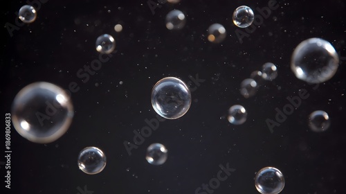 Wallpaper Mural Numerous translucent bubbles ascend and sparkle against a dark deep background Torontodigital.ca