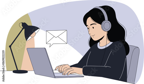 Woman working on laptop with headphones